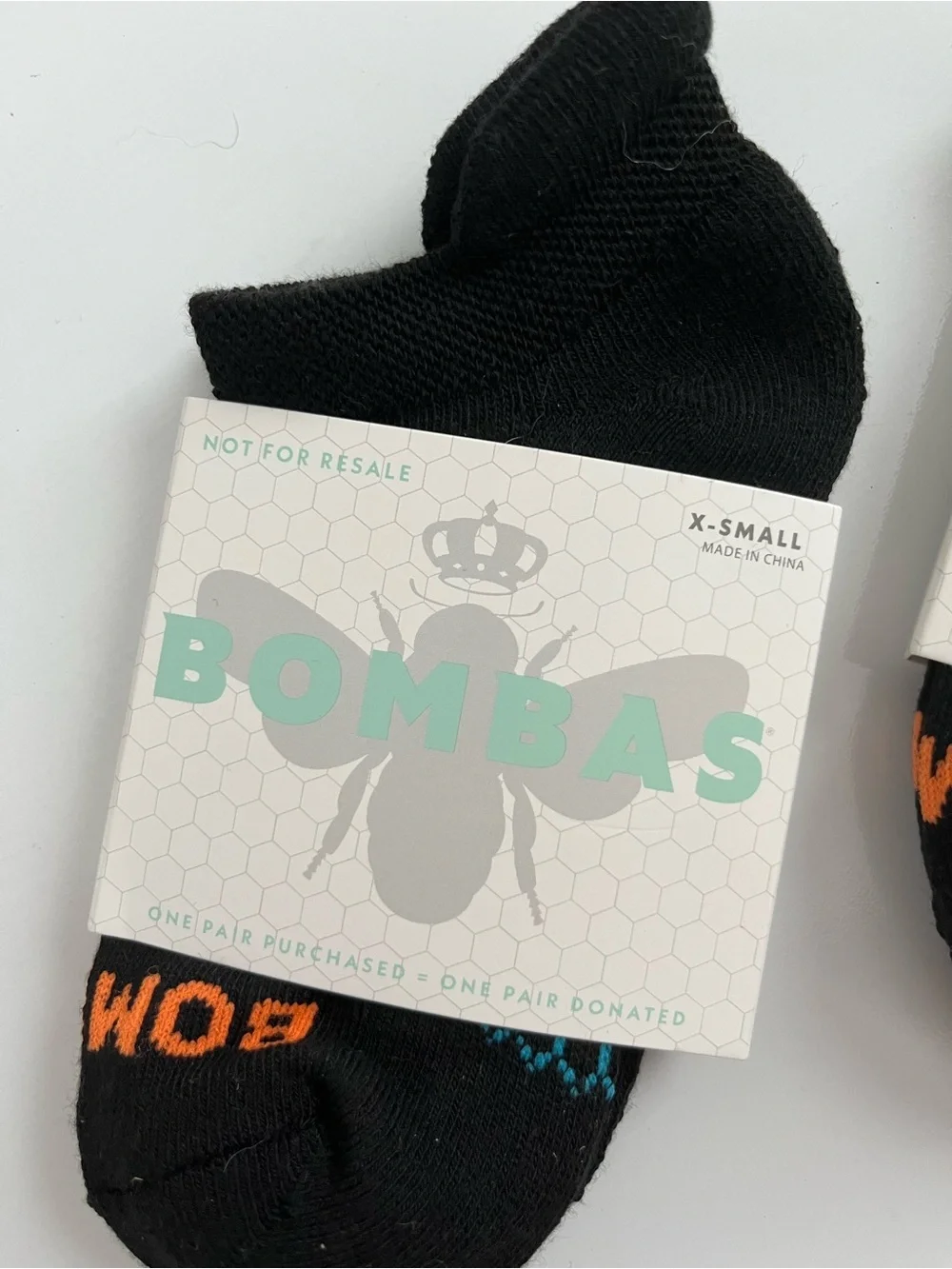 Bombas Black No-Show Socks with Orange Accent